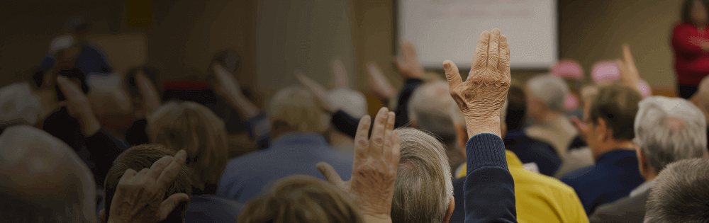 People Raising Hands